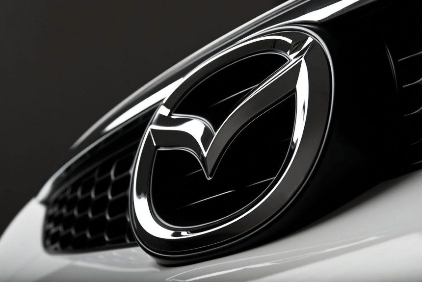 знак бренда mazda